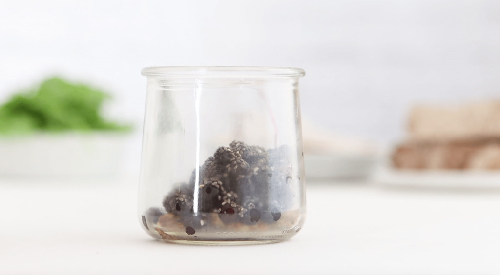 blueberries and whole grain mustard in a small glass jar