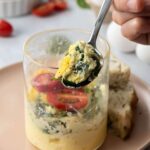 microwave egg bowl on a table with a fork