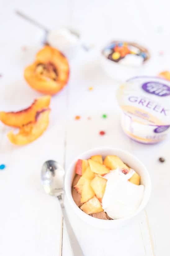 quick protein packed chocolate pudding with peaches on table