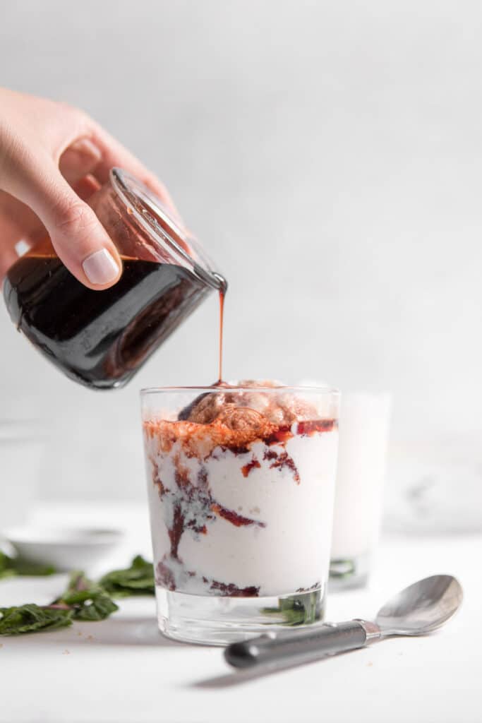frozen greek yogurt with tart cherry sauce in a cup