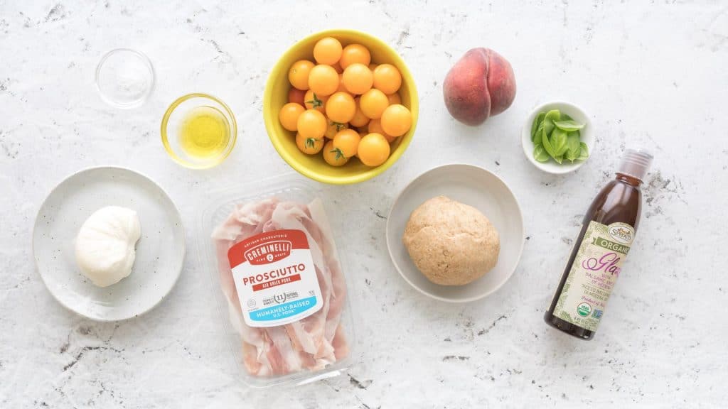 ingredients for peach and prosciutto pizza caprese