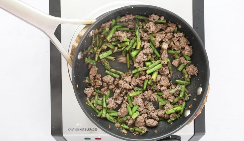 ground beef and vegetables in sautee pan