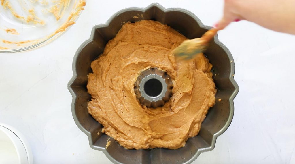 pumpkin cake batter in bundt pan