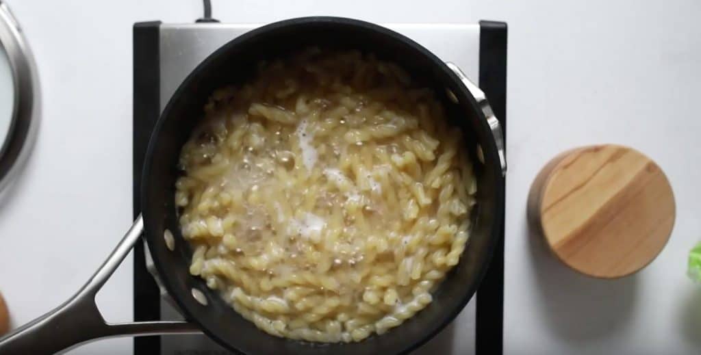 pasta boiling in black pot