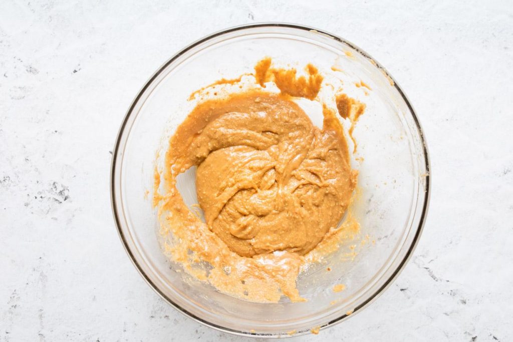 softened peanut butter in a glass bowl