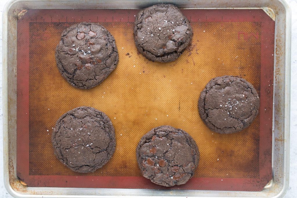 double chocolate cookies on a cookie sheet